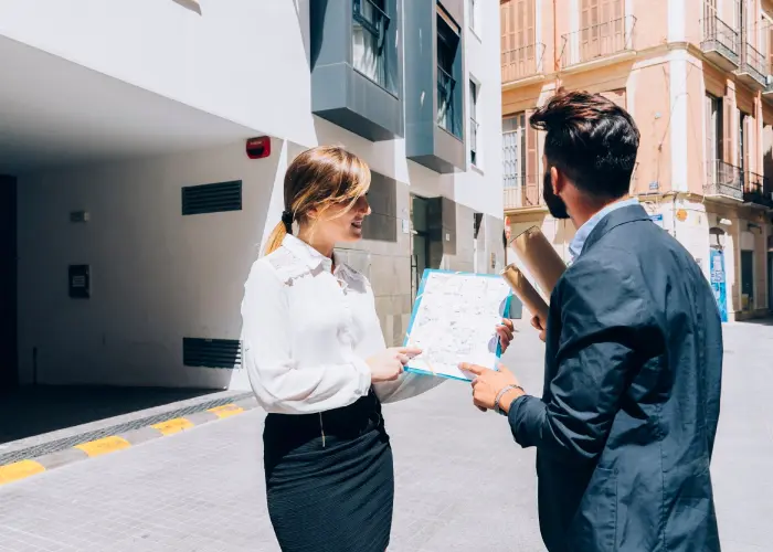 Commercial property leasing agent showing office premises
