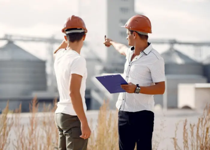 Industrial real estate agents assisting with warehouse property sales