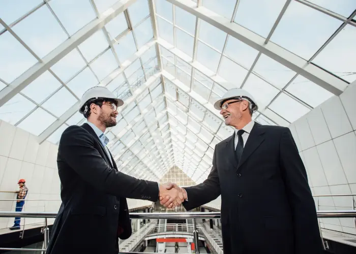 Industrial real estate agents advising clients on factory real estate
