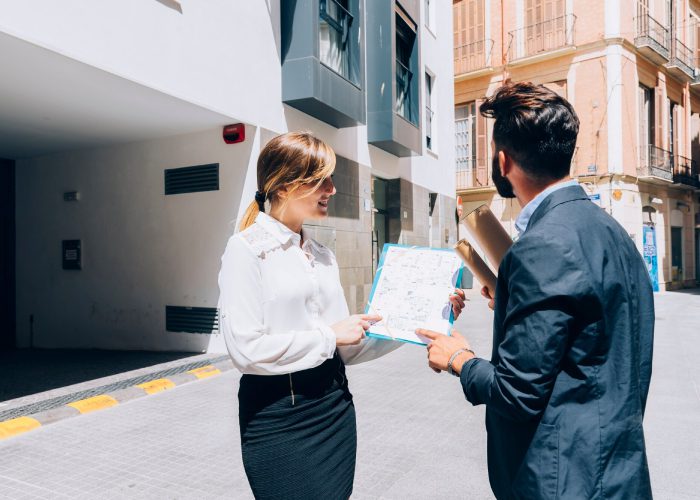 Commercial property leasing agent showing office premises